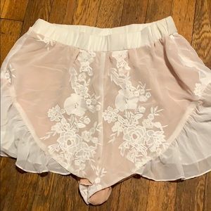 white embroidered ruffle shorts
